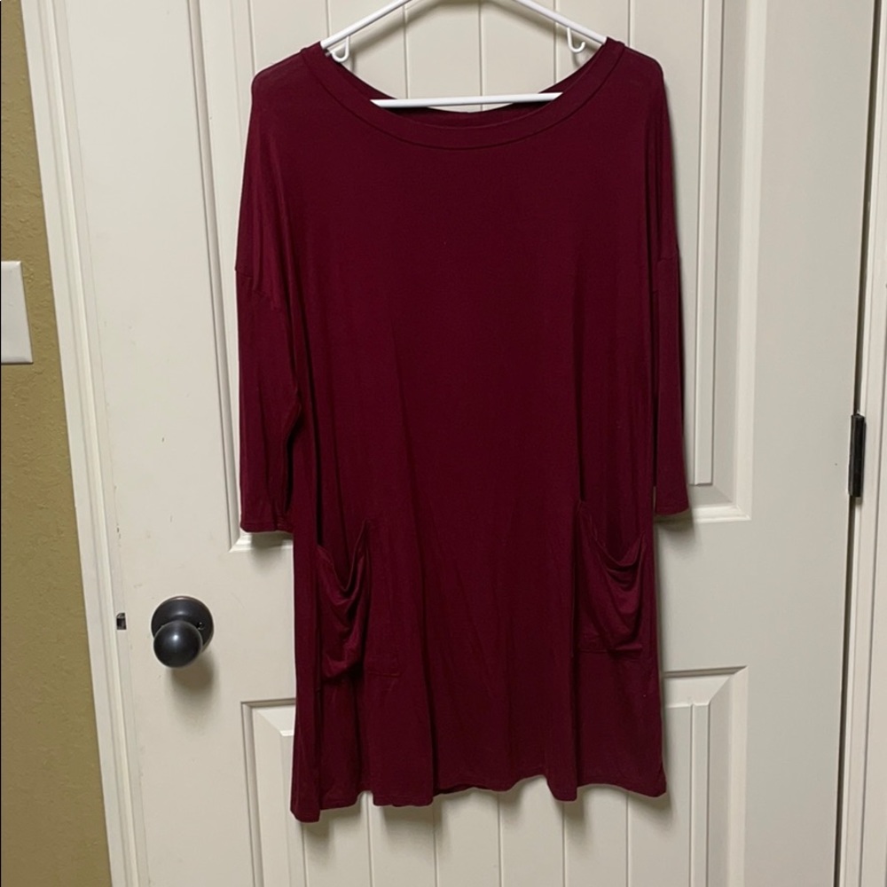 Burgundy long shirt with front pockets